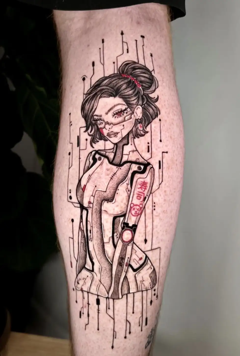 Cyberpunk anime girl tattoo with circuit patterns by Ayah at Omnia Tattoo Melbourne
